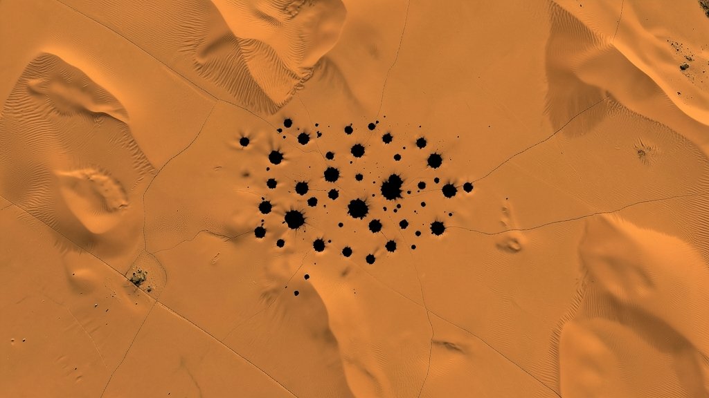A satellite image of the Sahara desert showing the eerie black spots and the effect on the sand dunes
